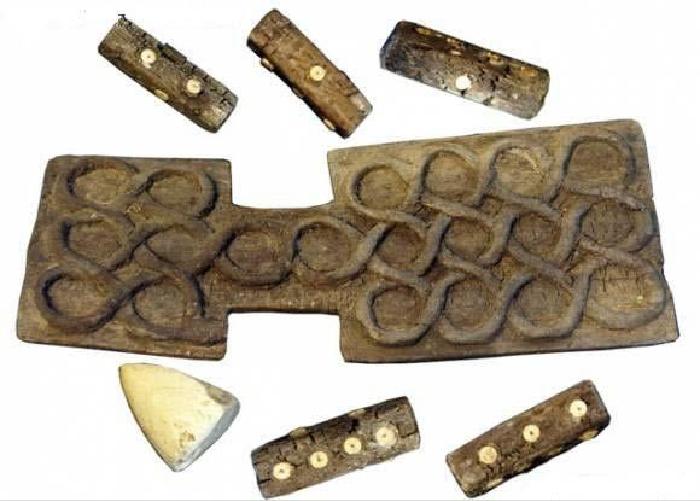 Elongated dice and a game board from Shahr-e Sukhteh.