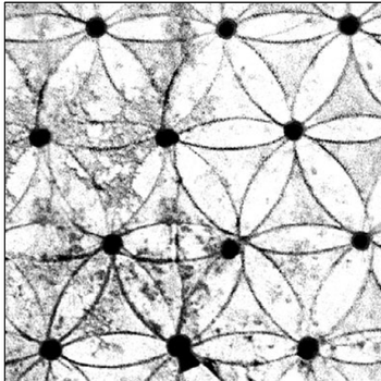 A triangular overlapping circles grid on a Phoenician ivory carving from about 900 BC.